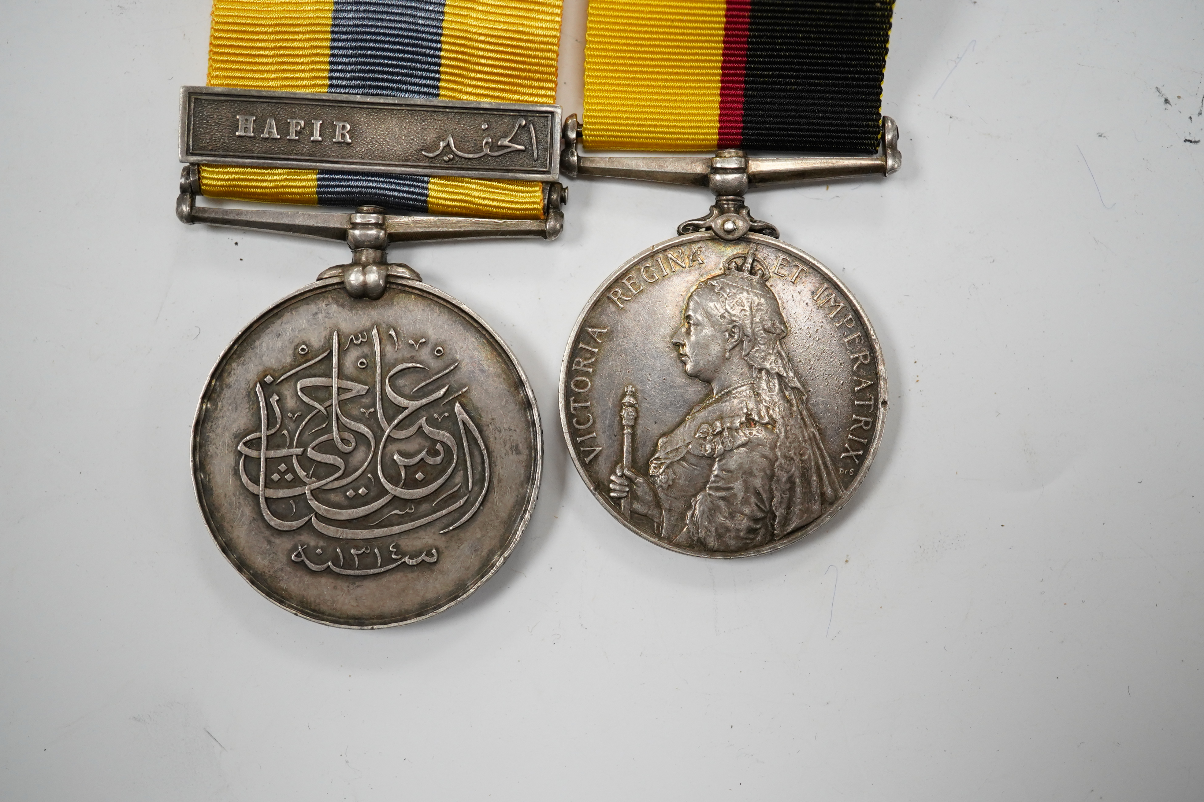 A Queen's Sudan Medal and a Khedive's Sudan (Hafir) Medal, both renamed to 4516 L Cpl W.J. Lee, Nth Stafford Rgt. Condition - fair.